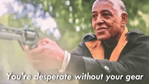 Man Holding Gun With Words You're Desperate Without Your Gear GIF