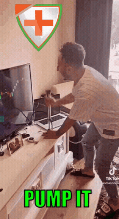 Man Holding Hammer In Front Of TV Saying Pump It GIF
