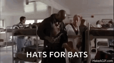 Man Holding Hammer In Room With Bunk Beds GIF