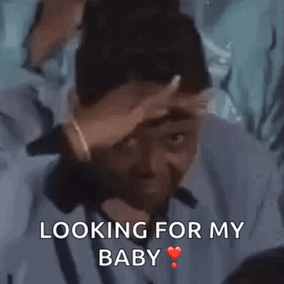 Man Holding Hand To Head Looking For Baby GIF
