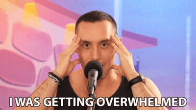 Man Holding Head At Microphone Saying I Was Getting Overwhelmed GIF