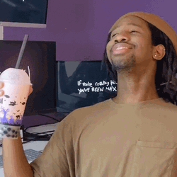 Man Holding His Milktea Deep Breathing GIF