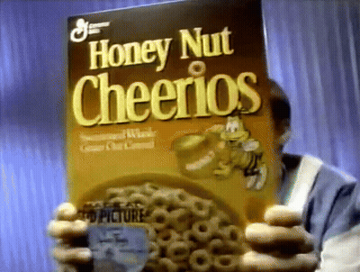 Man Holding Honey Nut Cheerios GIF