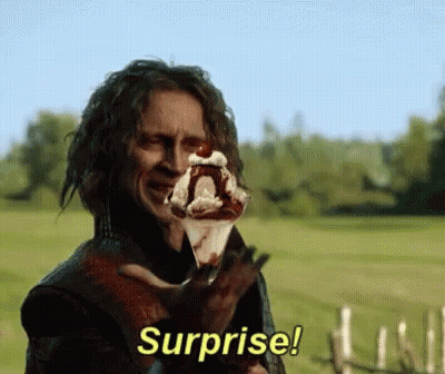 Man Holding Ice Cream Cone Says Surprise GIF