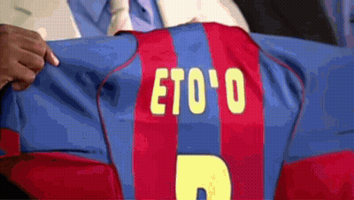 Man Holding Jersey With Name Eto'o GIF