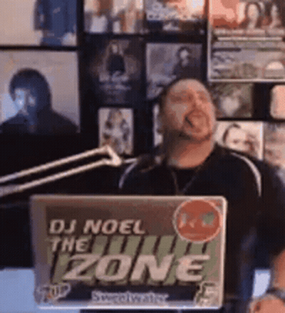 Man Holding Laptop Saying DJ Noel The Zone GIF