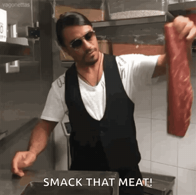 Man Holding Large Piece Of Meat GIF