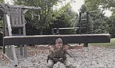 Man Holding Large Wooden Beam GIF