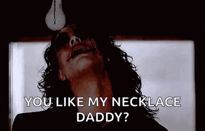 Man Holding Light Bulb In Mouth Asking If He Likes His Necklace Daddy GIF