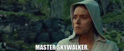 Man Holding Lightsaber in Front of Fire Master Skywalker