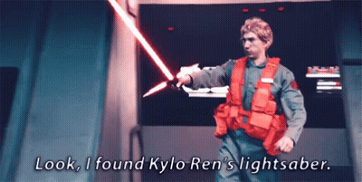 Man Holding Lightsaber Saying Look I Found Kylo Ren's Lightsaber GIF