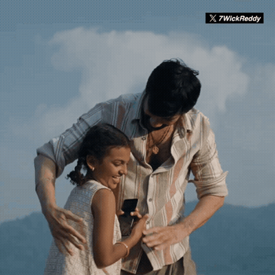 Man Holding Little Girl With Twickreddy Logo GIF