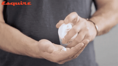 Man Holding Lotion Bottle Esquire GIF