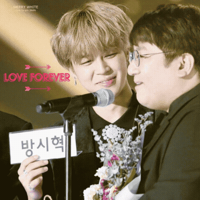 Man Holding Love Forever Sign GIF