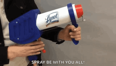 Man Holding Lysol Spray Gun GIF