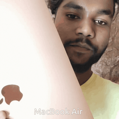 Man Holding MacBook Air GIF