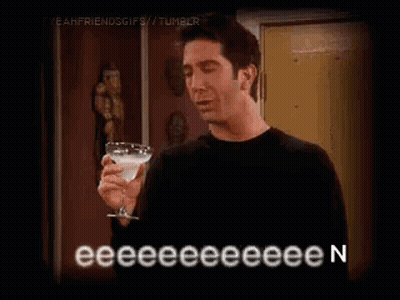 Man Holding Martini Glass Smiling Funny Face GIF