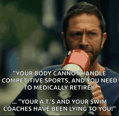 Man Holding Megaphone Says Your Body Cannot Handle Competitive Sports