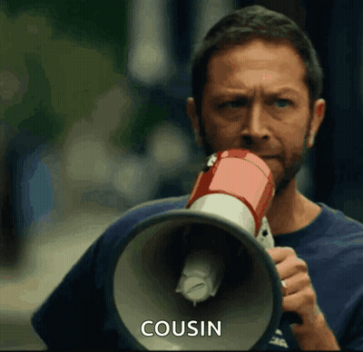 Man Holding Megaphone With Cousin GIF