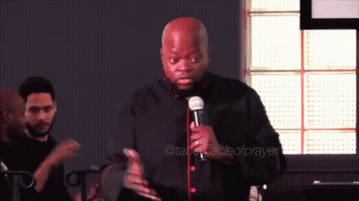 Man Holding Microphone At Prayer Sign GIF