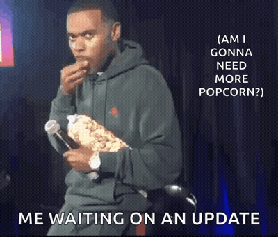 Man Holding Microphone Eating Popcorn GIF