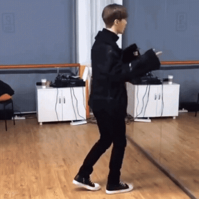 Man Holding Microphone In Dance Studio Mirror GIF
