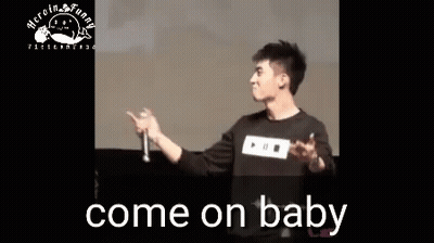 Man Holding Microphone On Stage GIF
