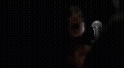 Man Holding Microphone Saying Adrianaa GIF
