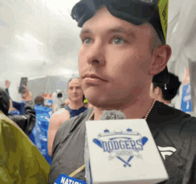 Man Holding Microphone Saying Dodgers GIF