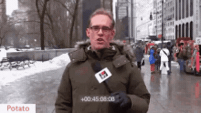 Man Holding Microphone Saying Potato GIF