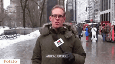 Man Holding Microphone Saying Potato GIF