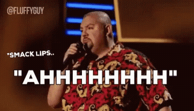 Man Holding Microphone Saying Smack Lips Ahhhh GIF