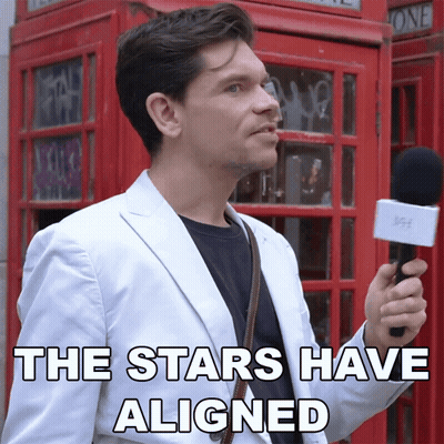 Man Holding Microphone Saying The Stars Have Aligned GIF