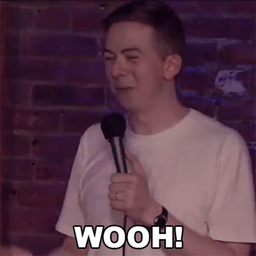 Man Holding Microphone Saying Wooh GIF