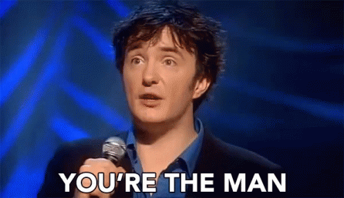 Man Holding Microphone Saying Youre The Man GIF
