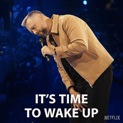 Man Holding Microphone Says It's Time To Wake Up GIF