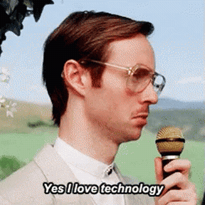 Man Holding Microphone Says Yes I Love Technology GIF