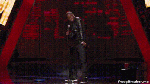 Man Holding Microphone Singing GIF