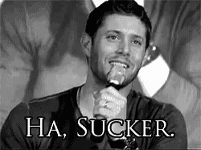 Man Holding Microphone Smiling GIF