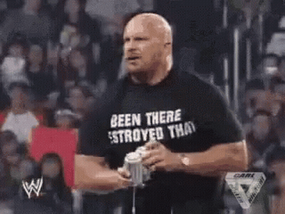 Man Holding Microphone Smoking In Front Of Crowd GIF