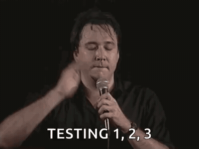 Man Holding Microphone Testing 1 2 3 GIF