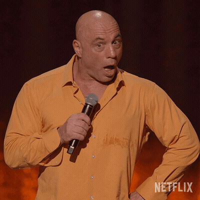 Man Holding Microphone With Netflix Logo GIF