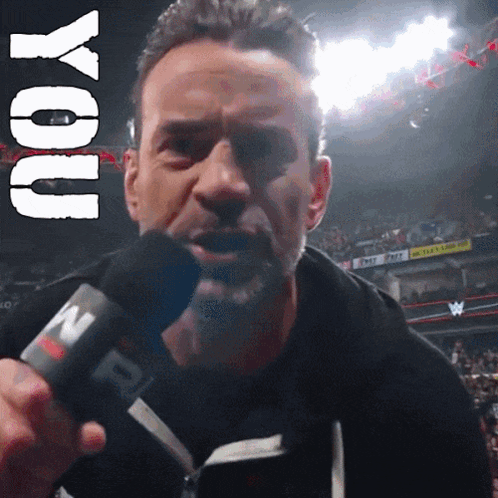 Man Holding Microphone With Word You Above GIF
