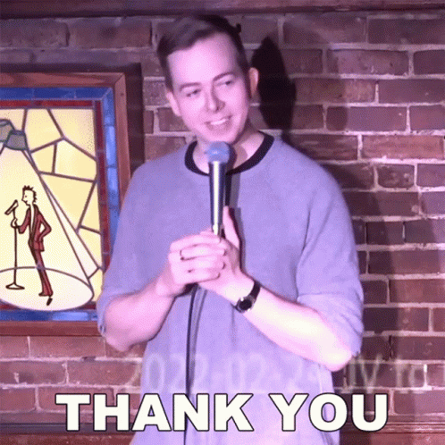 Man Holding Microphone With Words Thank You Above GIF