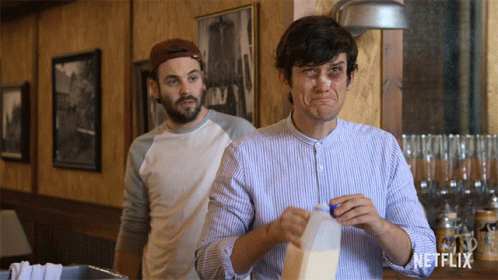 Man Holding Milk Carton With Netflix Logo GIF