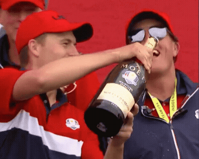 Man Holding Moet Champagne Bottle GIF