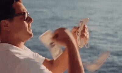 Man Holding Money And Cell Phone GIF