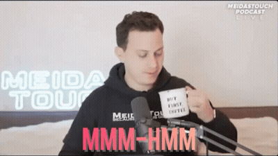 Man Holding Mug Saying Not First Coffee GIF