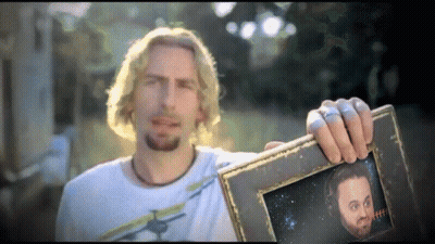 Man Holding Open-Mouthed Picture GIF