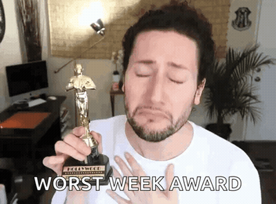 Man Holding Oscar Statue Worst Week Award GIF